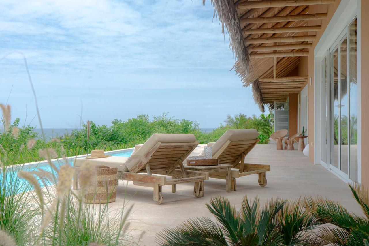 Tanusas Retreat & Spa Puerto Cayo Bagian luar foto