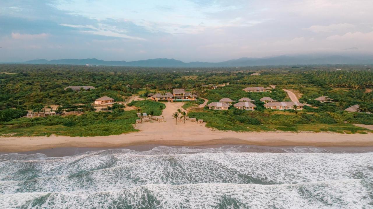 Tanusas Retreat & Spa Puerto Cayo Bagian luar foto