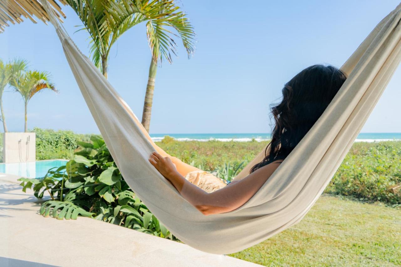 Tanusas Retreat & Spa Puerto Cayo Bagian luar foto