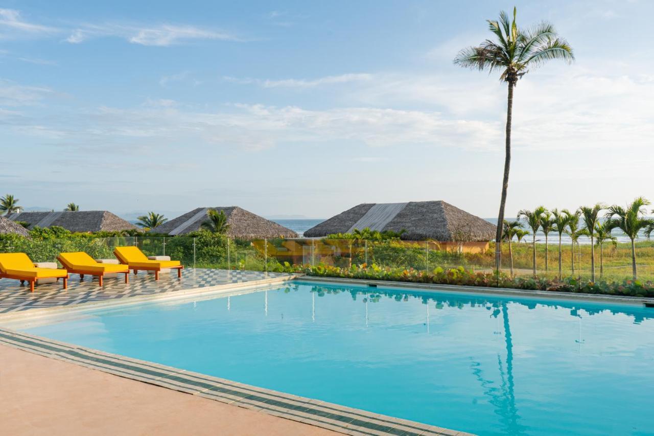 Tanusas Retreat & Spa Puerto Cayo Bagian luar foto