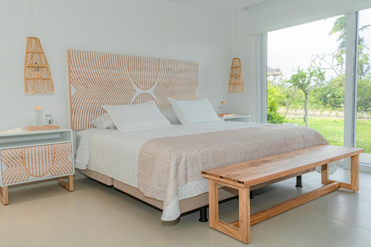 Tanusas Retreat & Spa Puerto Cayo Bagian luar foto